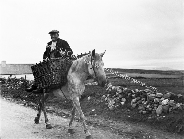 FARMER ON HORSEBACK WITH PANNIERS